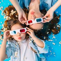 view-from-funny-mother-daughter-laying-floor-having-fun-camera-popcorn-isolated-blue-background-fashionable-family-jeans-clothes-wearing-3d-glasses-express.jpg